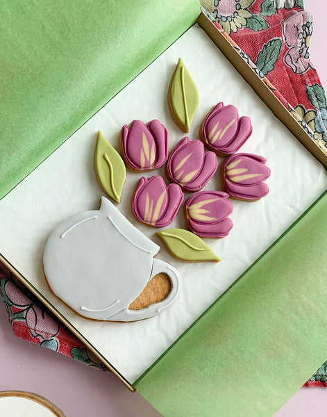 fondant covered tulip themed letterbox biscuits