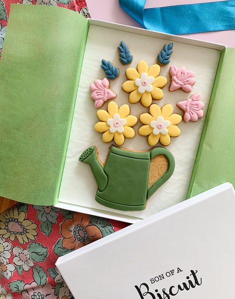 flower and garden themed iced letterbox biscuits